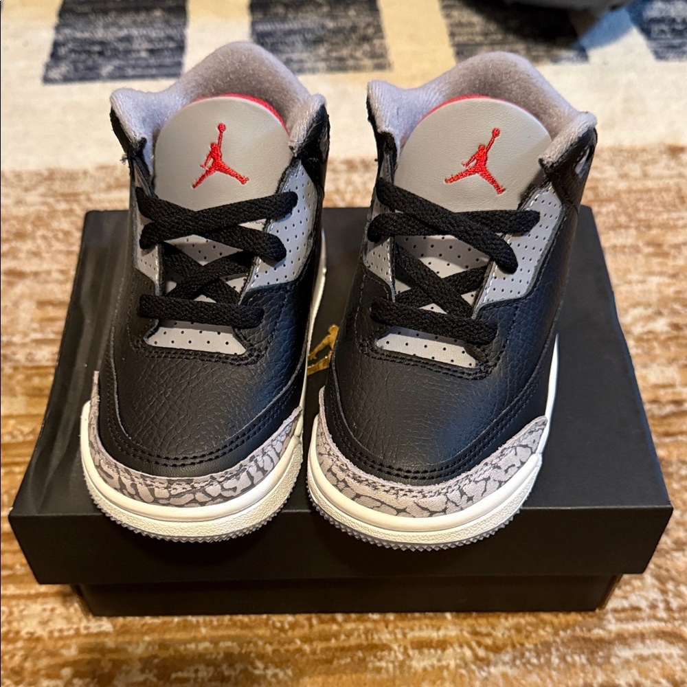 Jordan Kids Black and White Sneakers with Red Accents
